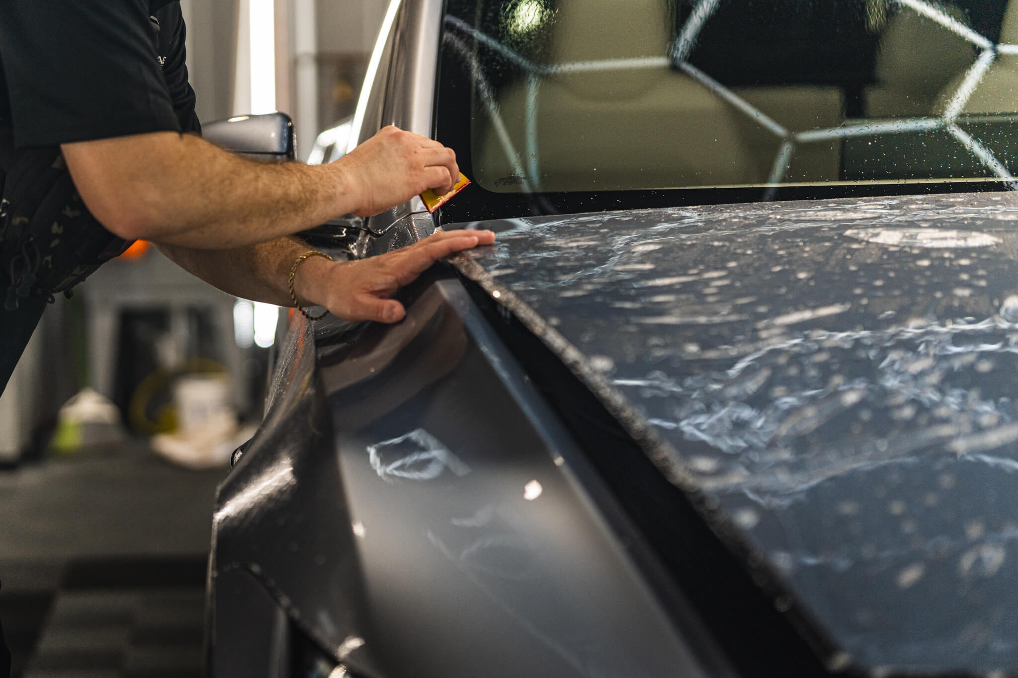 Paint Protection Film Belpre OH: Stop rock chips and scratches with self-healing PPF. Get invisible, heavy-duty paint protection at Mirror Image Detailing.